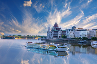River cruise ship passing the Hungarian Parliament in Budapest
